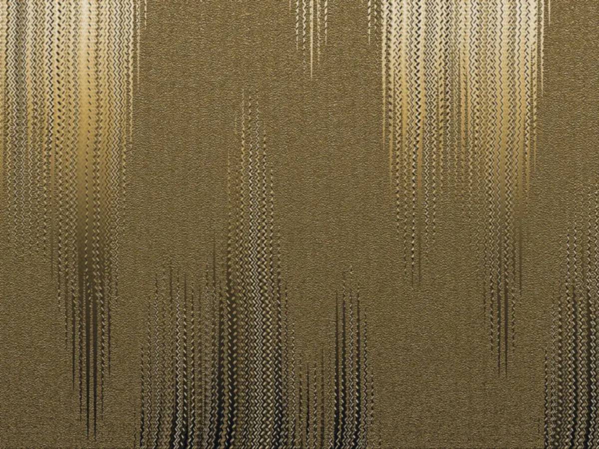 Gilded surface under a warm lamp